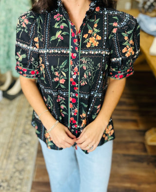 THE BUTTONED BLOOM