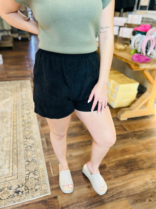 SLEEVELESS STAPLE