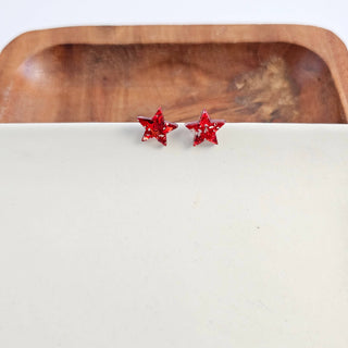 RED GLITTER STAR STUDS