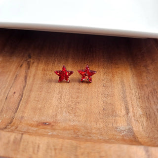 RED GLITTER STAR STUDS